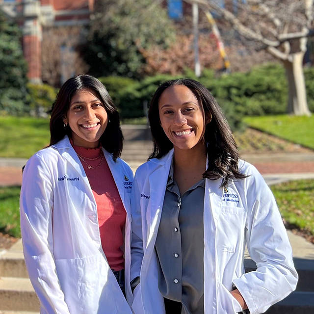 School of Medicine students and CASE co-presidents Mahima Krishnamoorthi and Megan Parker