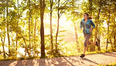 woman running on a trail