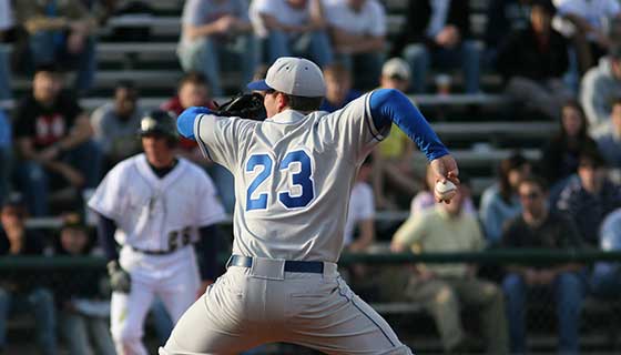 baseball pitcher throwing a ball