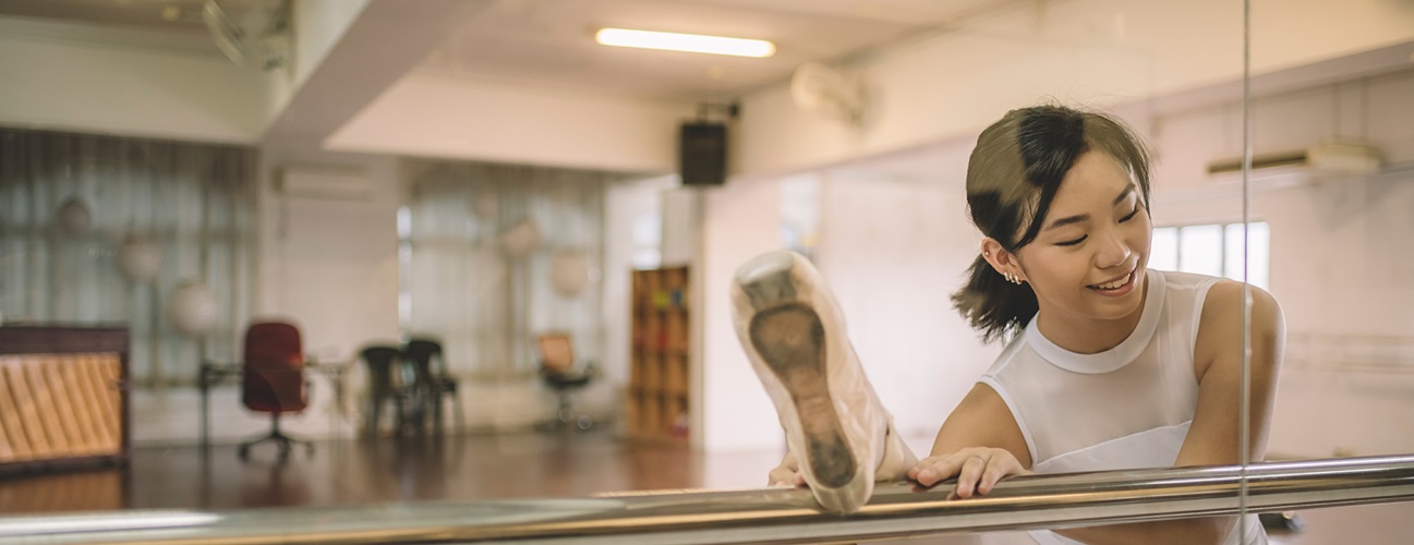 Ballet dancer practicing in studio