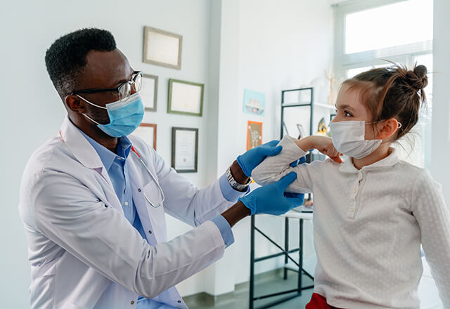 a pediatrician with child