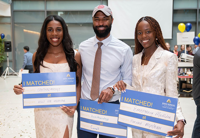 students celebrating their matches