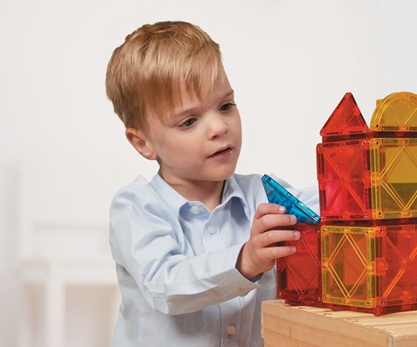 Landon playing with blocks