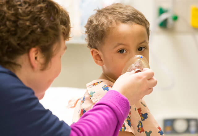 child receiving oxygen