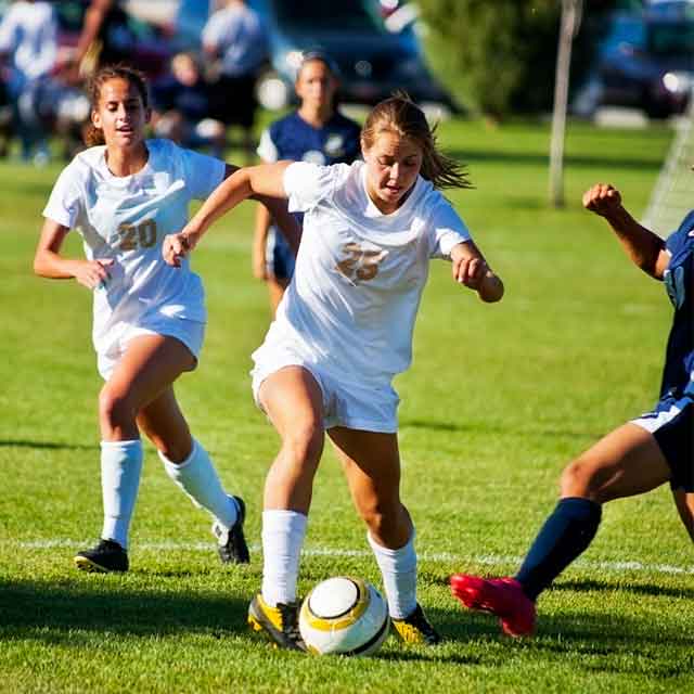 girls playing soccer