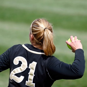 Girl throwing a softball