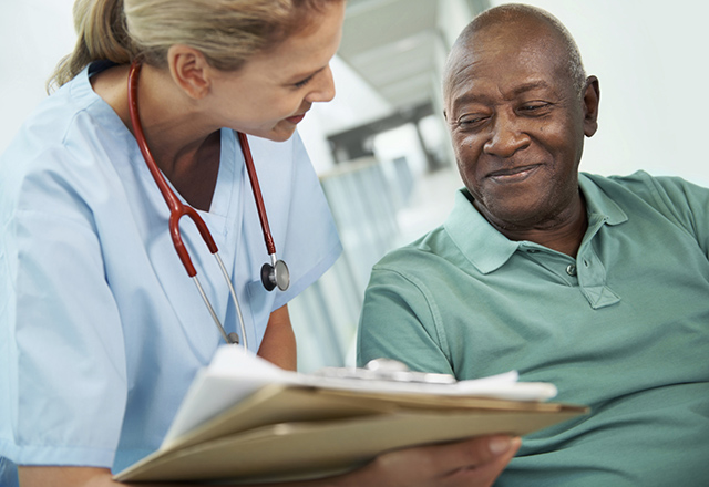 Doctor showing a patient files